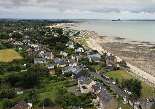 Vue du trait de côte de St Jean le Thomas en 2021 Vue du trait de côte de St Jean le Thomas en 2021