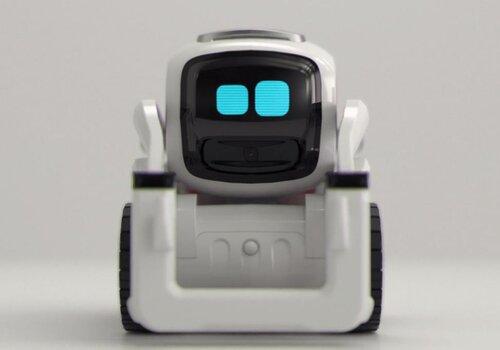 Robot blanc et noir avec des yeux carrés bleus