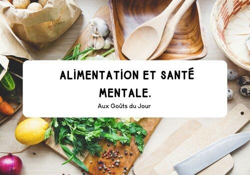 Affiche 'Alimentation et santé mentale' entourée de légumes, œufs, herbes et ustensiles de cuisine sur une table en bois.